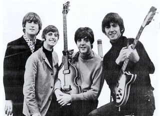 Beatles_ad_1965_just_the_beatles_crop.jpg